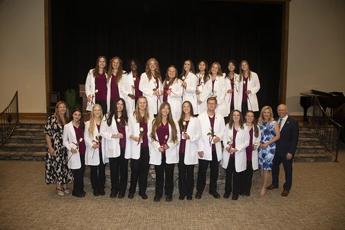 The Armstrong McDonald School of Nursing (AMSON) at College of the Ozarks holds its 19th annual White Coat Ceremony on Tuesday, Sept. 1. Nineteen members of the class of 2028 were coated.